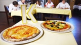 Pizzas vom Kurier: Von knusprig bis pampig (Artikel enthält Video)