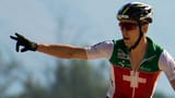 Olympiasieger Schurter trägt die Schweizer Fahne