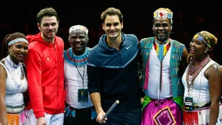 Federer, Wawrinka und Mitglieder des Ibuyambo Orchestra.