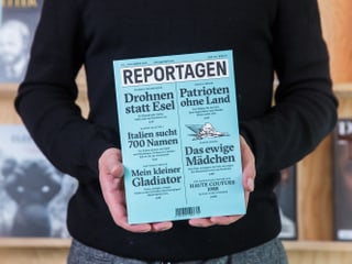 Titelbild der Zeitschrift "Reportagen", von einer Person in den Händen gehalten.