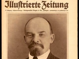 Zeitungsausschnitt mit Lenins Kopf im Bild