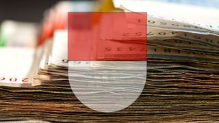 Ein Bündel Banknoten, davor das Solothurner Kantonswappen (Montage) Ein Bündel Banknoten, davor das Solothurner Kantonswappen (Montage)