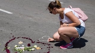 Kerzen und Blumen nach dem Amok in München