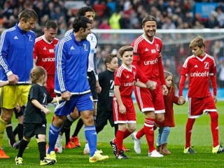 David Beckham mit seinen Kindern Cruz, Romeo and Harper
