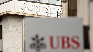 Logos von UBS und Credit Suisse