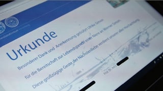 Urkunde für Organspenderin. Urkunde für Organspenderin.
