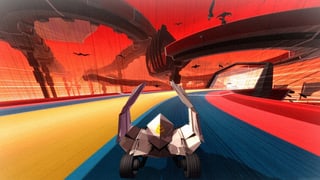 Ein Screenshot vom Spiel «Krautscape» zeigt ein futuristisches Fahrzeug auf einer bunten Rennstrecke.