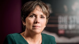 Margot Käβmann im Porträt. Sie trägt ein grünes Kleid.
