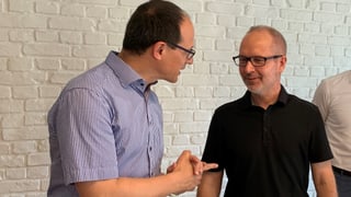Die beiden St. Galler Regierungsräte Marc Mächler (links) und Stefan Kölliker diskutieren über die tiefe Stimmbeteiligung. Die beiden St. Galler Regierungsräte Marc Mächler (links) und Stefan Kölliker diskutieren über die tiefe Stimmbeteiligung.