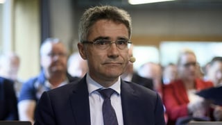 Mario Cavigelli bei einer GV. Er trägt eine Brille. Mario Cavigelli bei einer GV. Er trägt eine Brille.