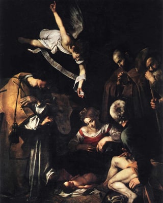 Eine Engel schwebt über der Krippenszene mit Baby Jesus. Eine Engel schwebt über der Krippenszene mit Baby Jesus.