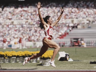 Florence Griffith-Joyner 1988 im olympischen 100-m-Final von Seoul.