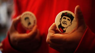 Ein Badge mit einem «Obamao», einer Mischung aus Mao und Obama, drauf. Ein Badge mit einem «Obamao», einer Mischung aus Mao und Obama, drauf.