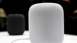 Ein weisser HomePod von Apple.