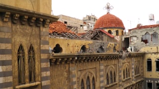 Eine beschädigte Kirche in Homs.