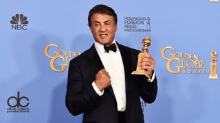 Porträt Sylvester Stallone mit Golden Globe. 