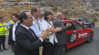 Hollande feuert mit Prudhomme die Fahrer an. 