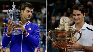 Djokovic (links) und Federer (rechts) stemmen je einen Pokal in die Höhe