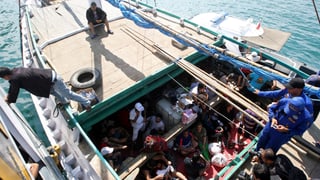 Flüchtlinge in Boot. Flüchtlinge in Boot.