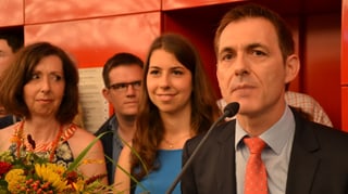 Bürgermeister vor Mikrofon