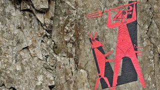 Das Felsbild mit dem roten Teufel in der Schöllenen.