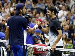 Feliciano Lopez und Roger Federer.