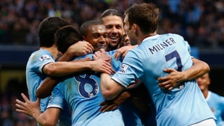 Jubelnde Manchester-Spieler
