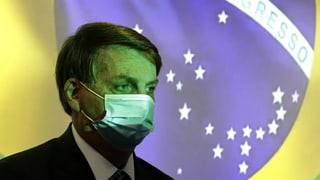 Brasiliens Präsident Jair Bolsonaro mit einer Schutzmaske. 