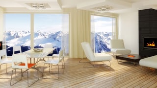 Moderne Wohnung mit weissen Möbeln und Bergpanorama