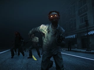 Eine Zombie-Horde schlurft bei Nacht auf den Betrachter zu.