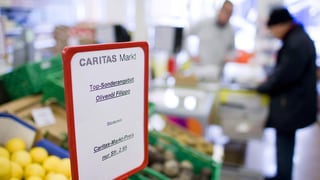 Schild in Caritas-Markt.