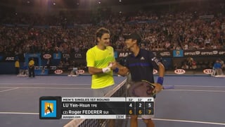 Lu gratuliert Federer.