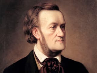 Porträt (halbnah) von Richard Wagner. Zum Hemd trägt er ein gebundenes seidenes Tuch.