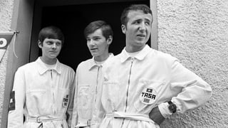 Drei Männer in weissen Overalls Drei Männer in weissen Overalls