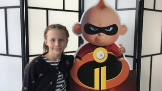 Kind mit Superheldenbaby.