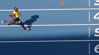 Usain Bolt läuft ins Ziel. Usain Bolt läuft ins Ziel.