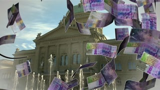 Herunterflatternde Tausendernoten vor dem Bundeshaus.