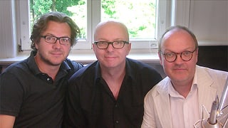Andreas Fröhlich, Oliver Rohrbeck und Jens Wawrczeck, die seit über 30 Jahren den drei jugendlichen Detektiven der Hörbuchreihe «Die drei ???» ihre Stimme leihen.