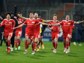Union-Spieler jubeln