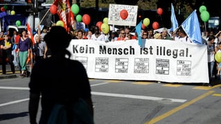Demonstranten mit Plakat. Demonstranten mit Plakat.