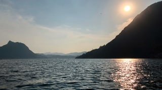 Sonnenaufgang am Luganersee bei Gandria. Sonnenaufgang am Luganersee bei Gandria.