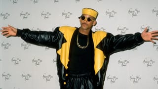Auf dem Bild ist Will Smith zu sehen wie er cool bei den American Music Awards post. Auf dem Bild ist Will Smith zu sehen wie er cool bei den American Music Awards post.