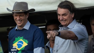 n Minister of the Environment, Ricardo Salles (L), and President of Brazil, Jair Bolsonaro (R), participate in the March of the Christian Family for Freedom, in Brasilia, Brazil, 15 May 2021. Supporters of Bolsonaro promoted rallies throughout Brazil as the head of stateâÄ&#x2122;s popularity is at its lowest level since he took office. EPA/Joedson Alves