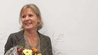 Frau mit Blumenstrauss.