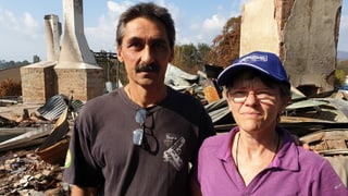 Philippe und Marie-Claude Ravenel vor den Ruinen ihres Hauses. Philippe und Marie-Claude Ravenel vor den Ruinen ihres Hauses.