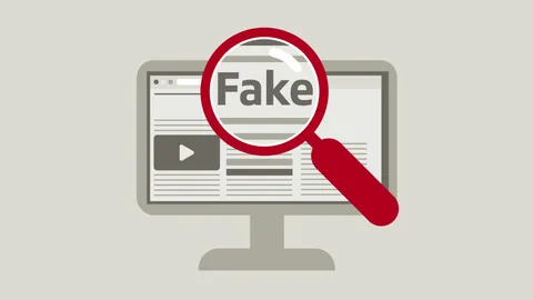 Illustration eines Computerbildschirms mit einem grossen roten Vergrösserungsglas über dem Wort 'Fake'.