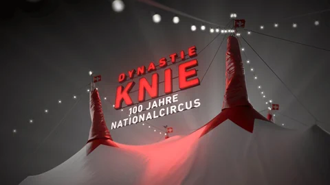 Visual Zirkus Knie in roter Schrift vor nächtlichem Himmel