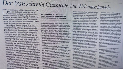 Zeitungsartikel über Iran mit dem Titel 'Der Iran schreibt Geschichte. Die Welt muss handeln'.