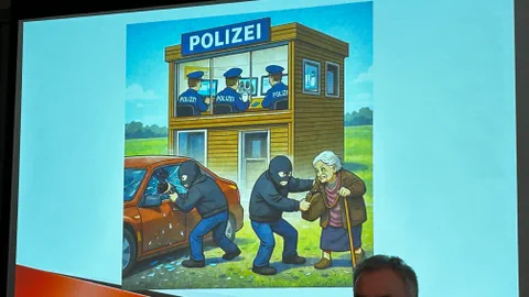 Karikatur zeigt Polizei in Wache, während Räuber alte Frau ausrauben.