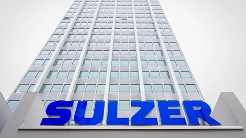 Blaues Logo vor Hochhaus.